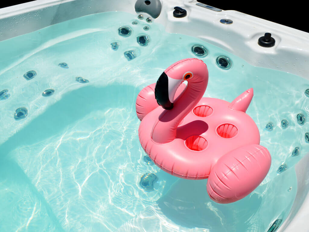 a flamingo float in the water